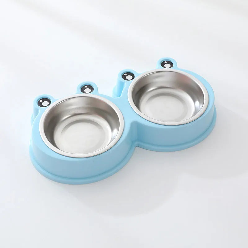 A stainless steel pet bowl with two compartments for water and food, shown in blue.