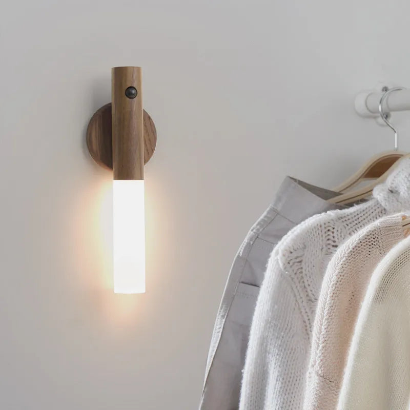 Smart sensor LED desk lamp in wood and glass, showing compact size and warm white light.