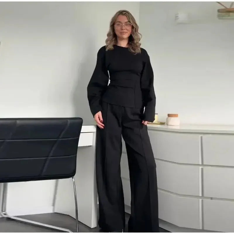 Women's black polar fleece suit set with O-neck top and wide leg trousers