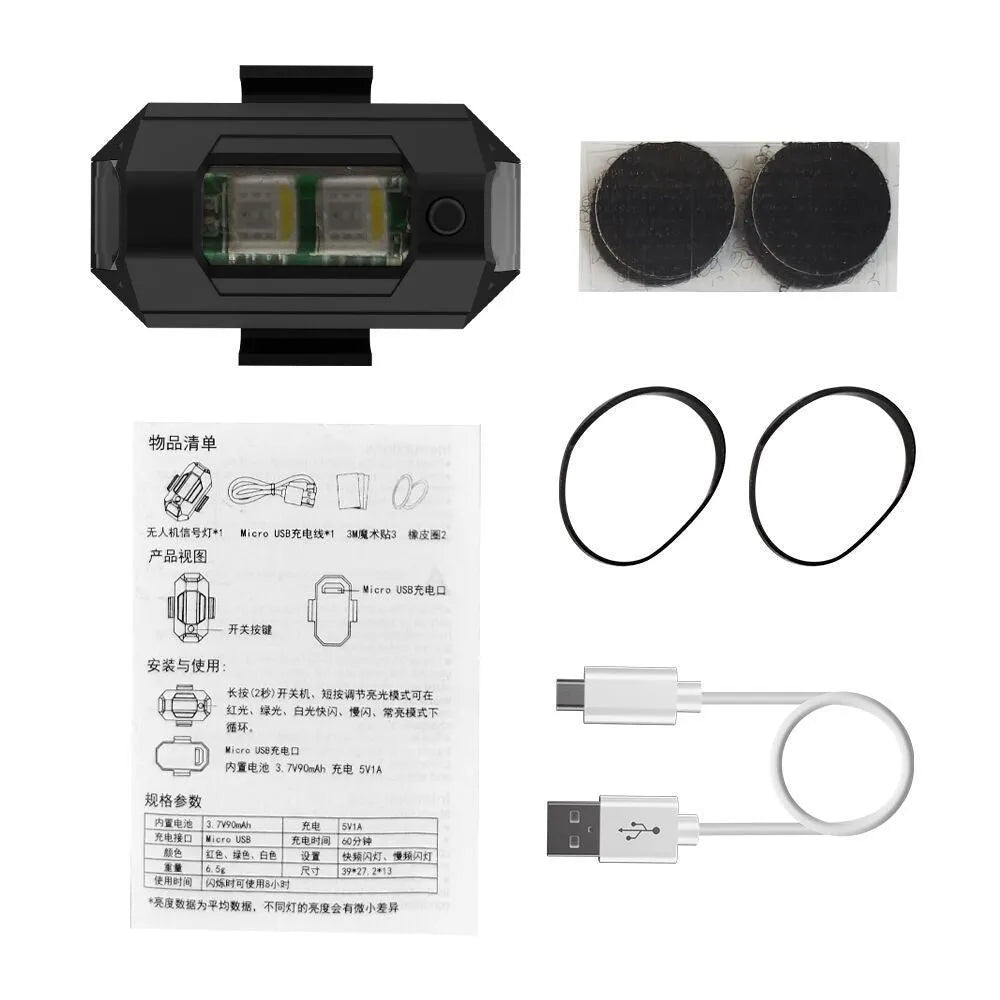 Drone signal light with RGB LED strobe, Type-C cable, fixing tape and ring belts on a table