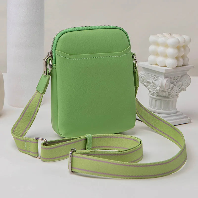 Small solid-colour PU crossbody shoulder bag for mobile phone.