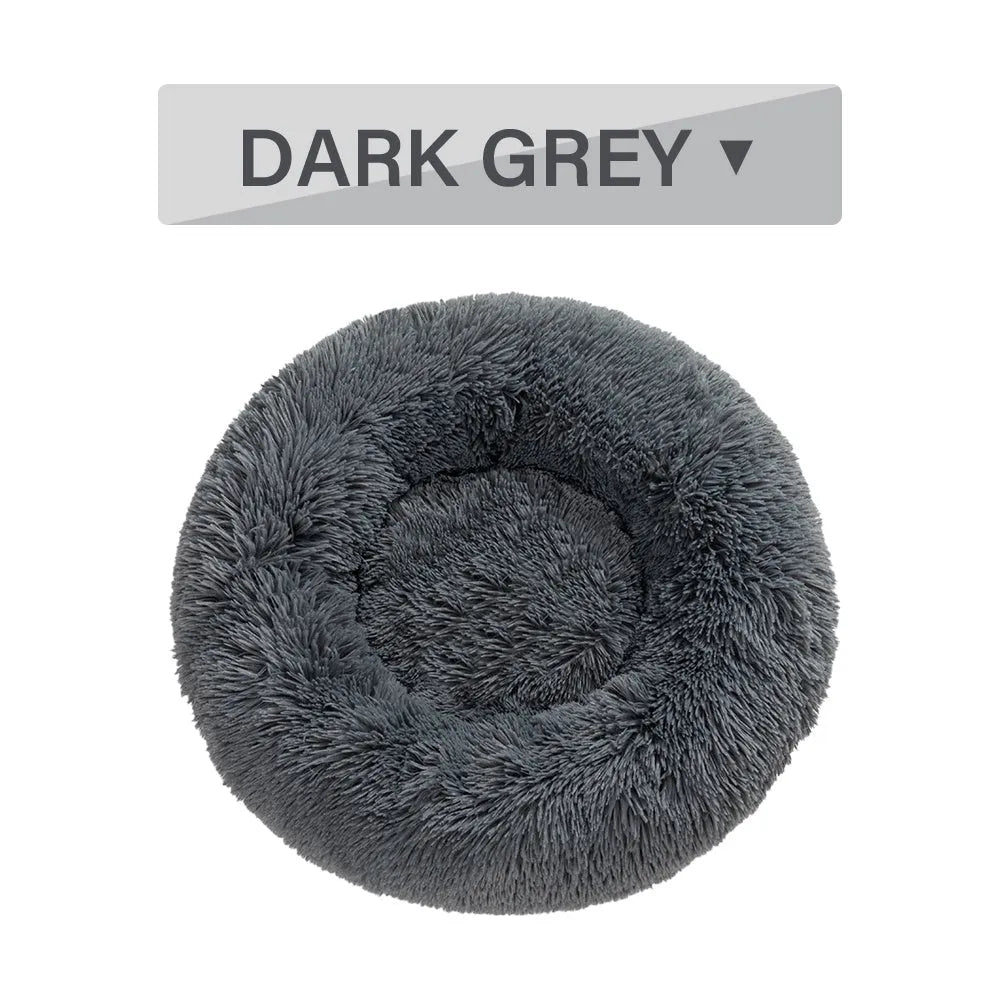 Donut-shaped long plush pet bed with raised sides, shown in a neutral colour.