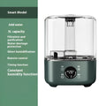Green KC-112 intelligent humidifier with touch screen display and remote control on flat surface