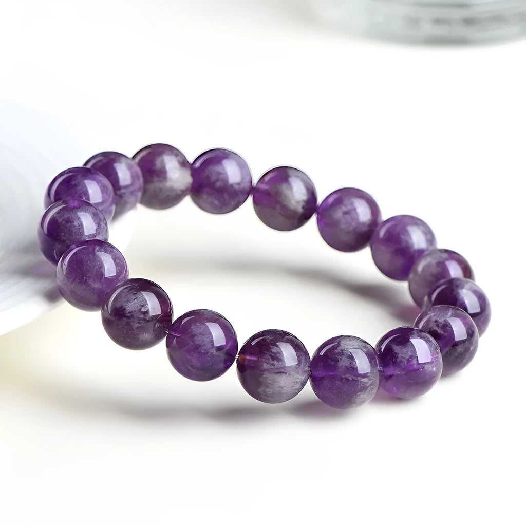 Natural feather amethyst crystal bracelet in Snow Mountain purple colour with scattered beads design