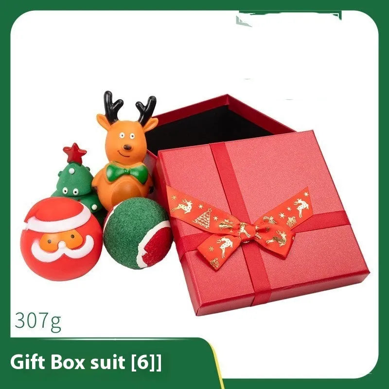 Set of colourful Christmas-themed vinyl dog chew toys including balls, ropes, and Santa figures.