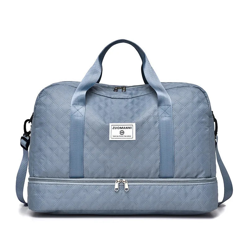 Oxford cloth travel bag with 36-55 litre capacity for leisure trips and buggy use in solid colour options