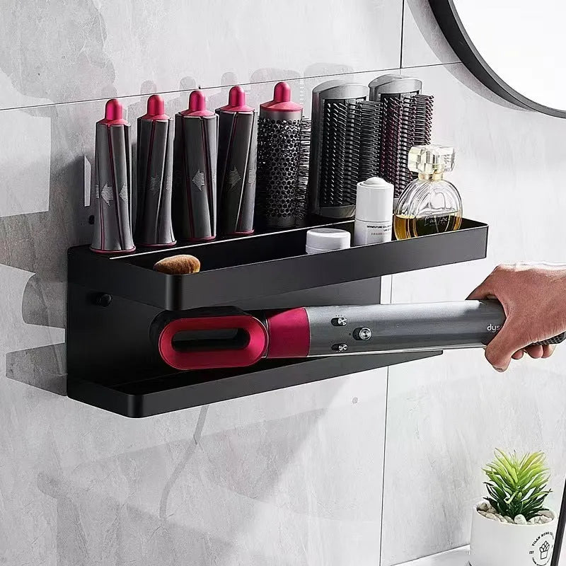 White double-layer aluminium bathroom storage rack holding Marcel Waver hair curlers with adhesive mounting