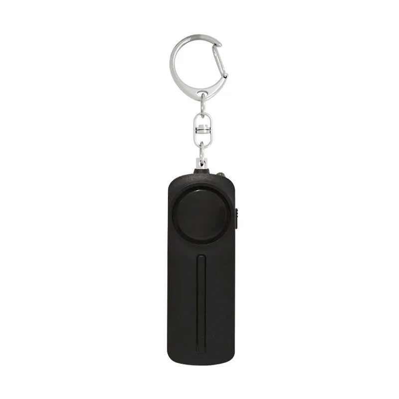 Compact pink personal safety alarm showing 130 dB siren specification and six-hour duration.