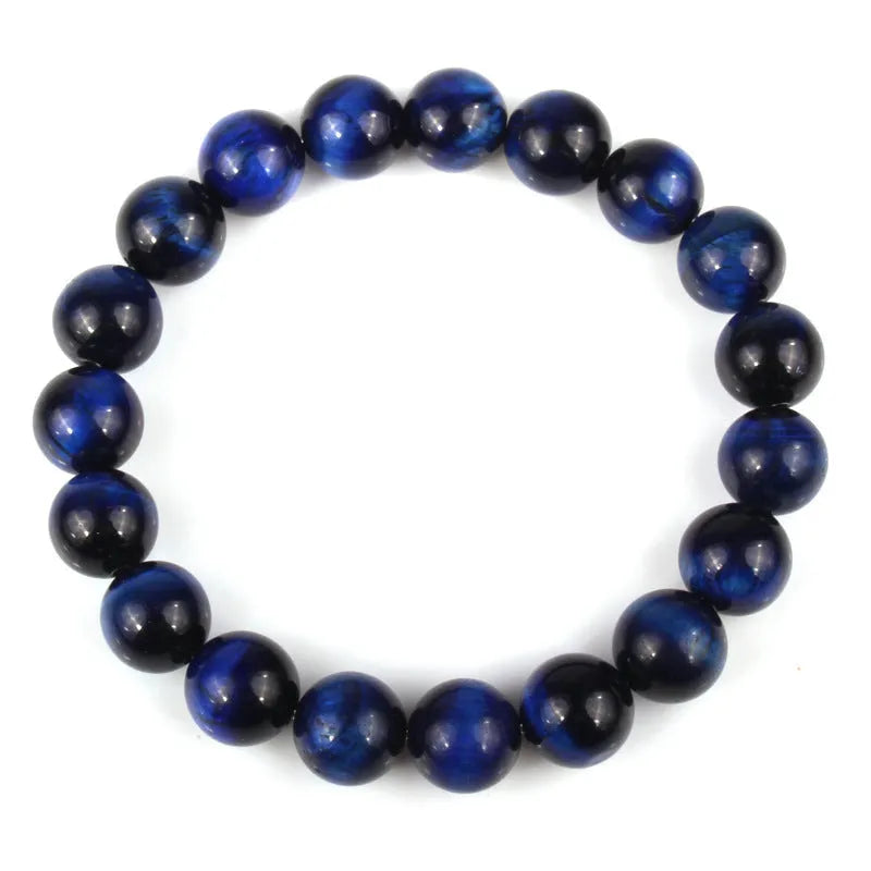 Natural tiger eye crystal beaded bracelet for men and women on a white background.
