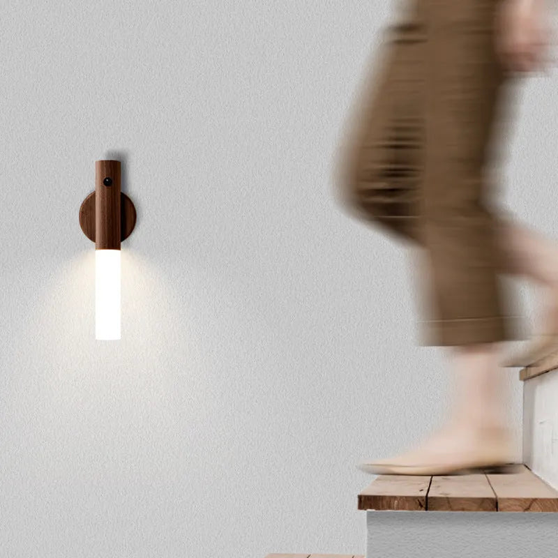 Smart sensor LED desk lamp in wood and glass, showing compact size and warm white light.