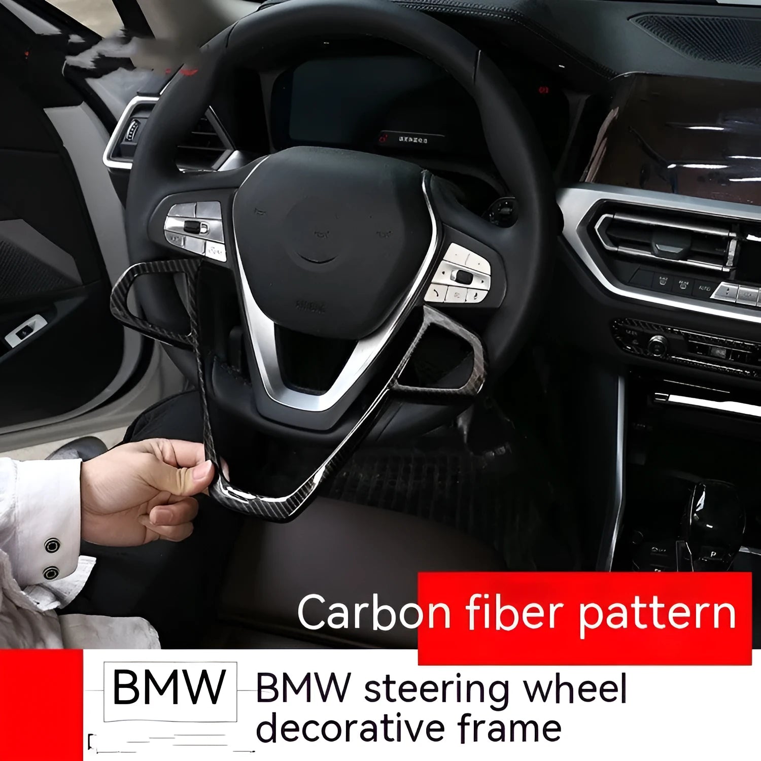 BMW steering wheel button frame decoration in black carbon fibre pattern.