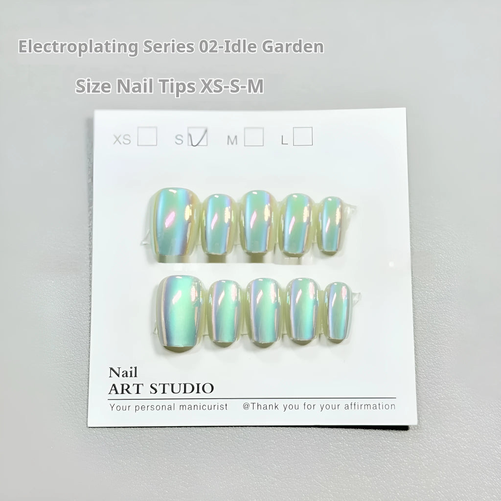 Electroplated Cat's Eye false nail set showing aurora armour and solid colour styles in short ladder sizes.