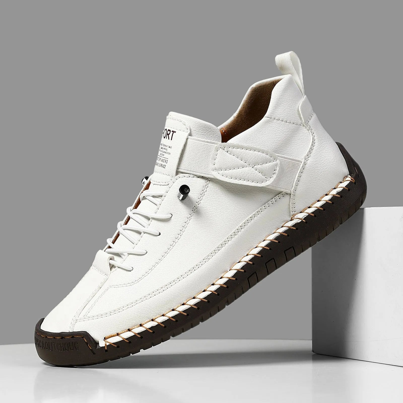 Men's mid-top Martin boot in a solid colour with elastic band and round toe.