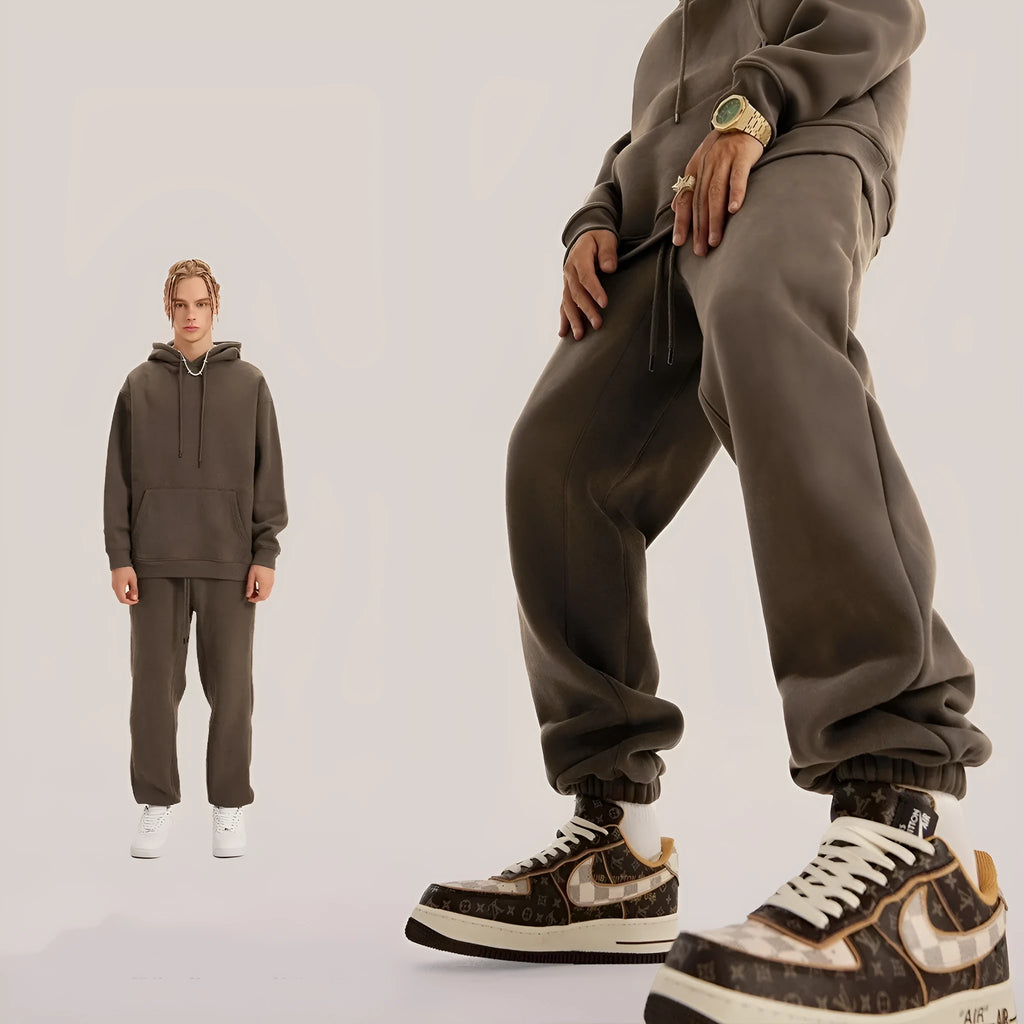 Men's solid colour cotton velvet casual sweatpants with elasticated waist and ankle cuffs.