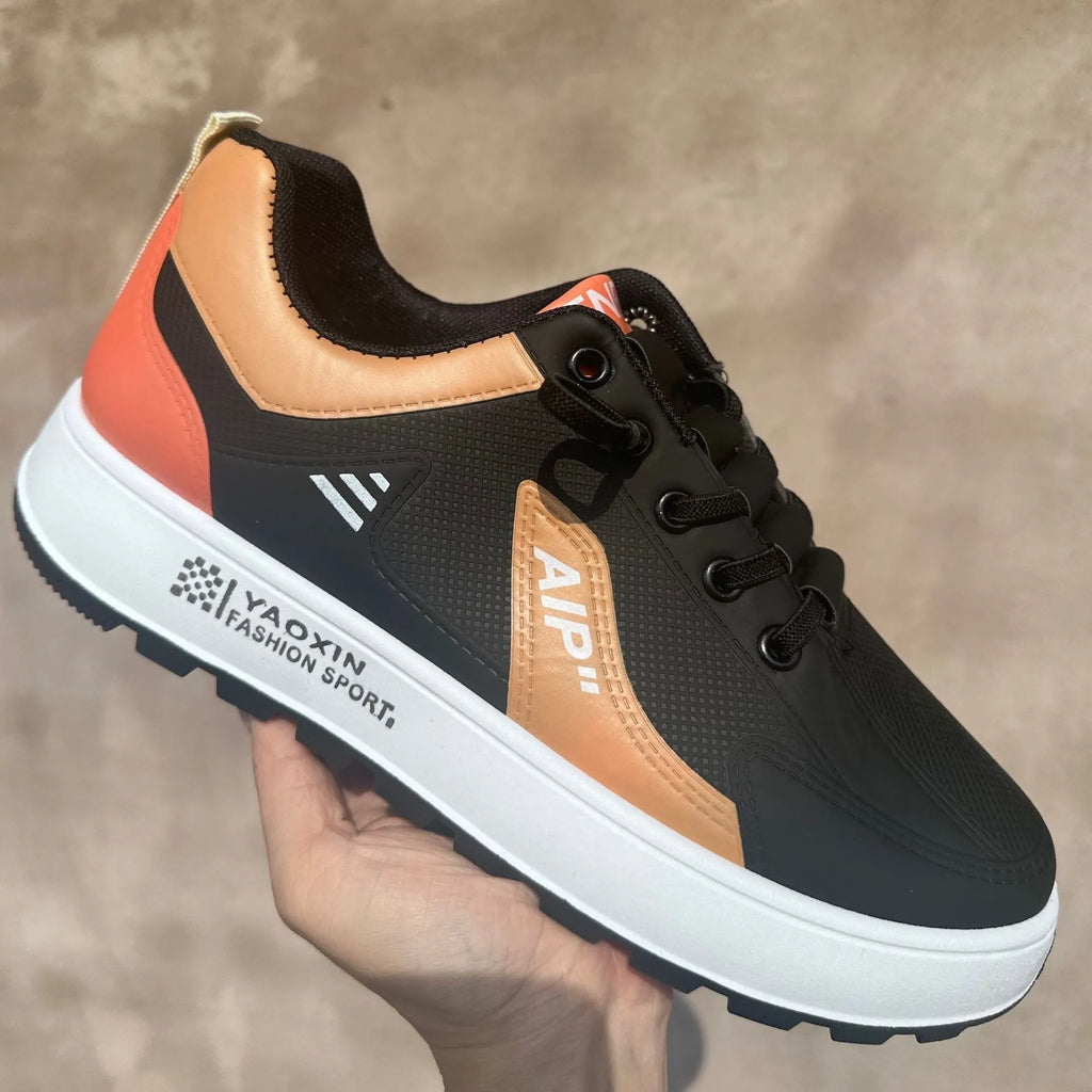 Men's casual shoes in artificial PU with round toe, available in white and orange, white and black, or white and brown colours