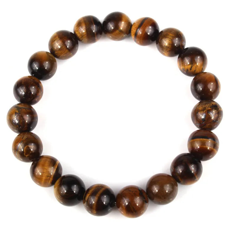 Natural tiger eye crystal beaded bracelet for men and women on a white background.