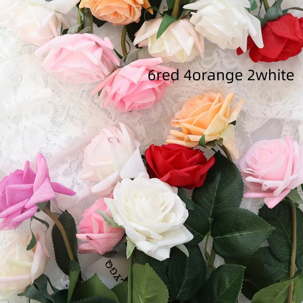 Artificial silk rose bouquet with red fabric flower head and green plastic stem