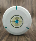 AC automatic sweeping robot on wooden floor with black ABS plastic body