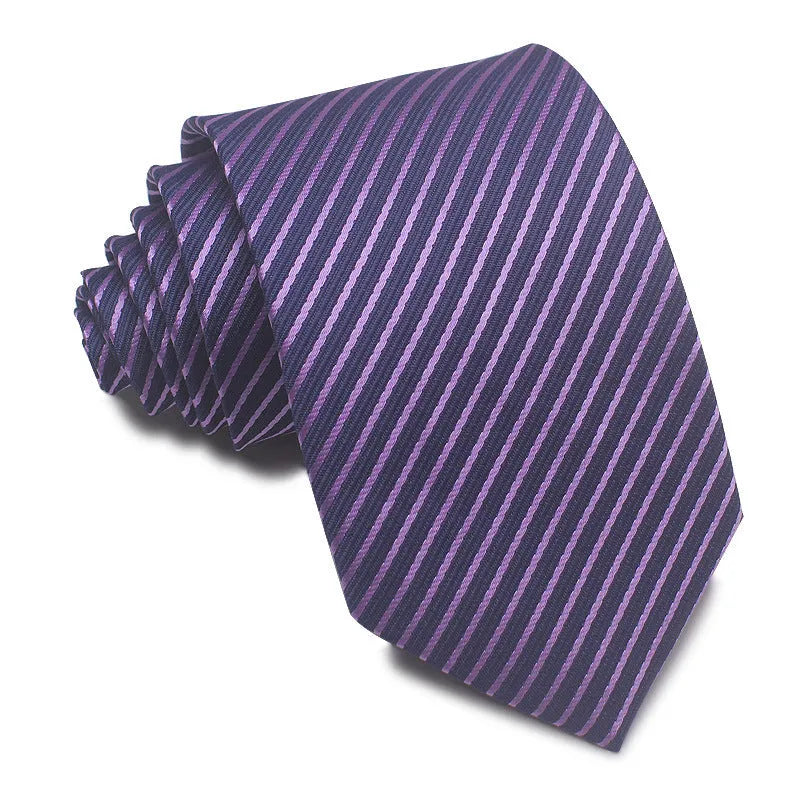 Close-up of a red, black, and blue striped men's formal tie with a textured Jacquard weave.