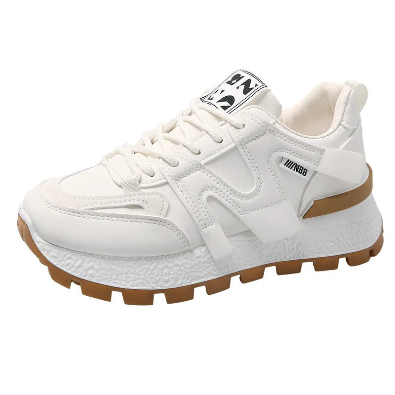 Unisex low-top running sneaker in black with round toe, lace-up front, and rubber sole on a white background.