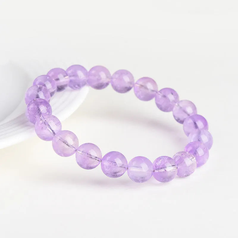 Lavender amethyst crystal bracelet with round beads in water ripple geometric pattern