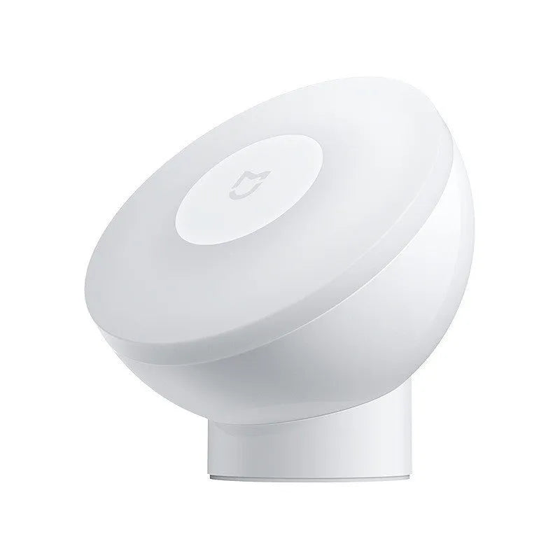 White Mijia Night Light 2 Bluetooth lamp with PC shade and inductive sensor on bedside table