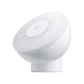 White Mijia Night Light 2 Bluetooth lamp with PC shade and inductive sensor on bedside table