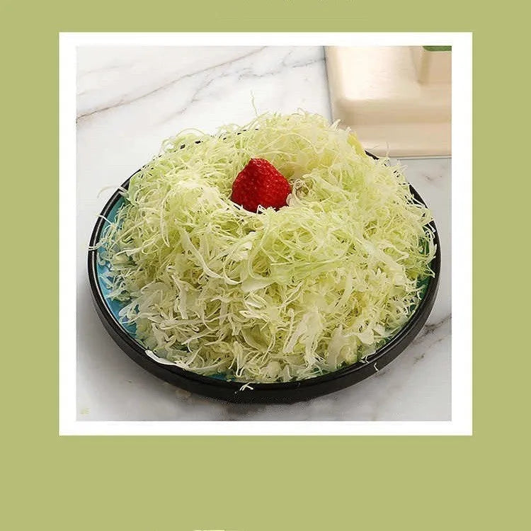 Beige household vegetable slicer and grater with stainless steel blades