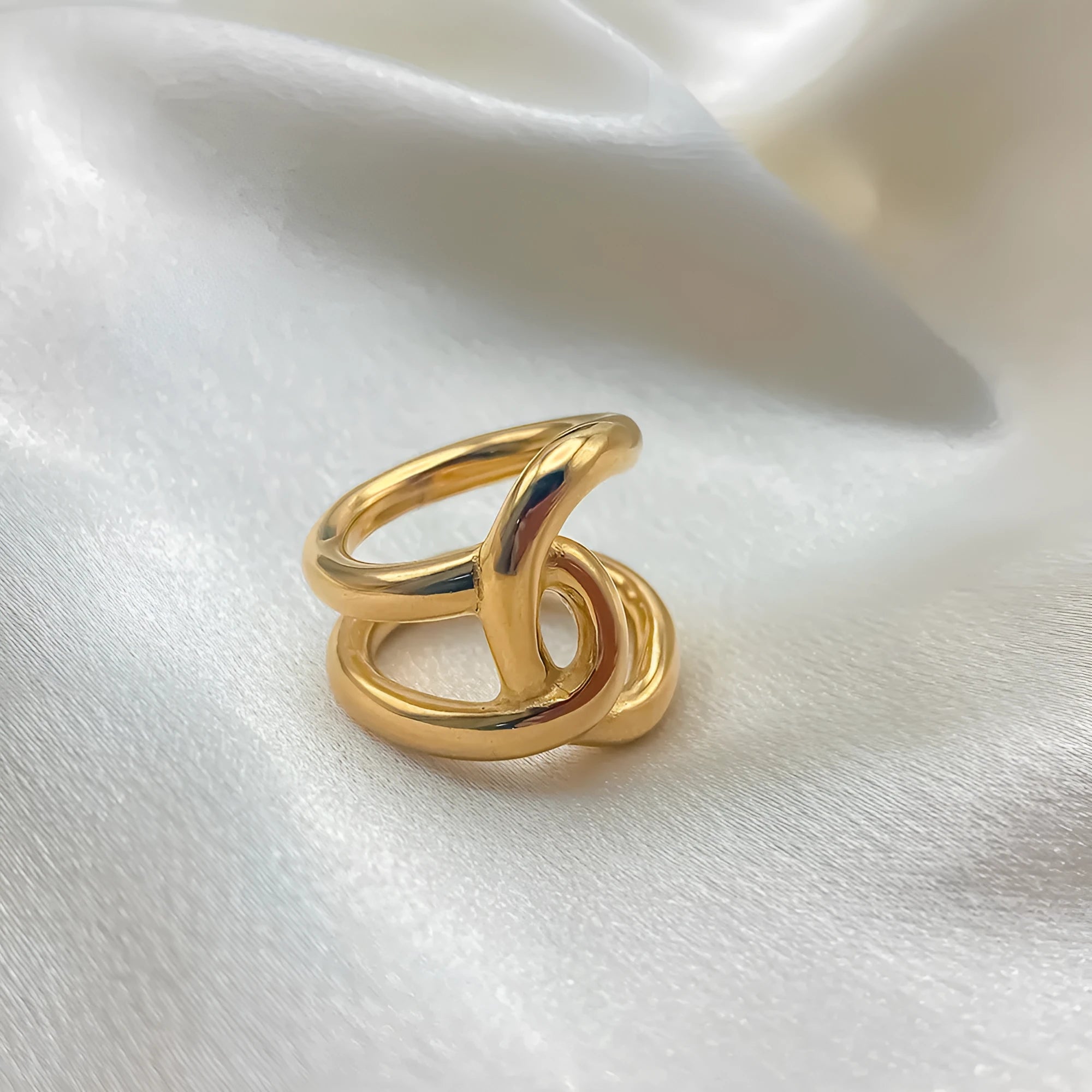 Women's stainless steel adjustable knot ring with geometric U-shape and opening design