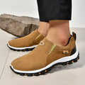 Men's grey PU slip-on overshoes with a round toe and rubber sole, shown on a foot.