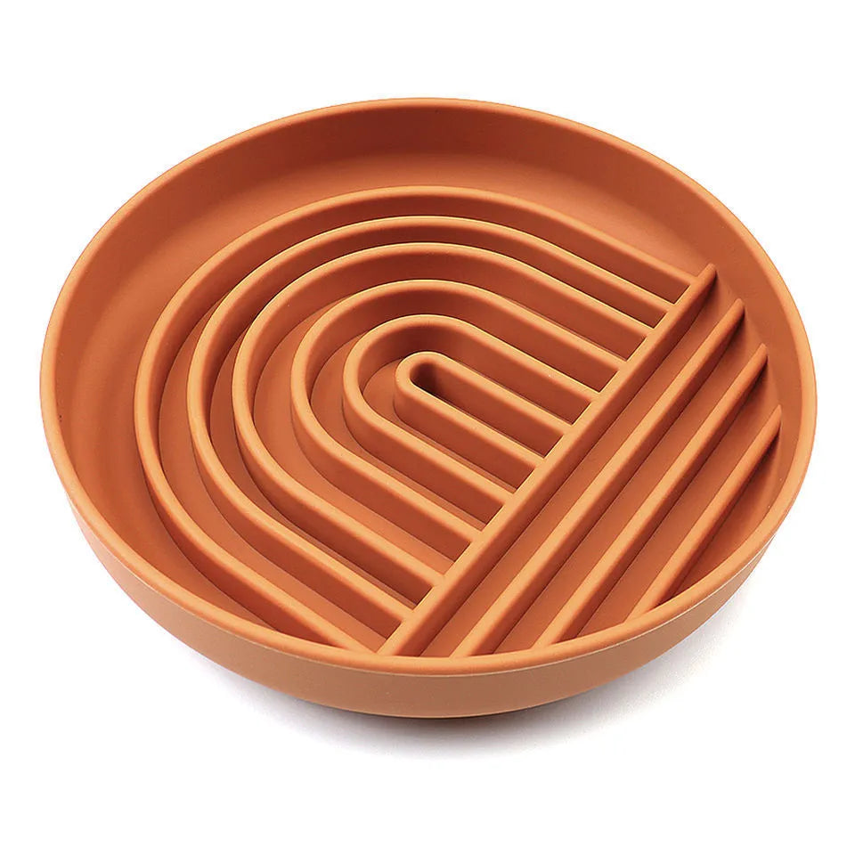 Silicone dog slow feeder bowl with textured ridges, shown in mustard green colour.