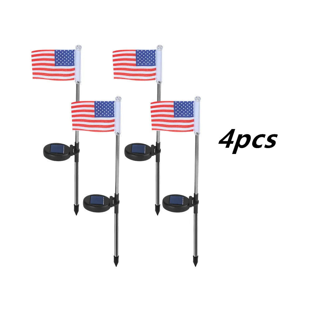 Solar garden flag light with stainless steel pole showing either American or British flag design.