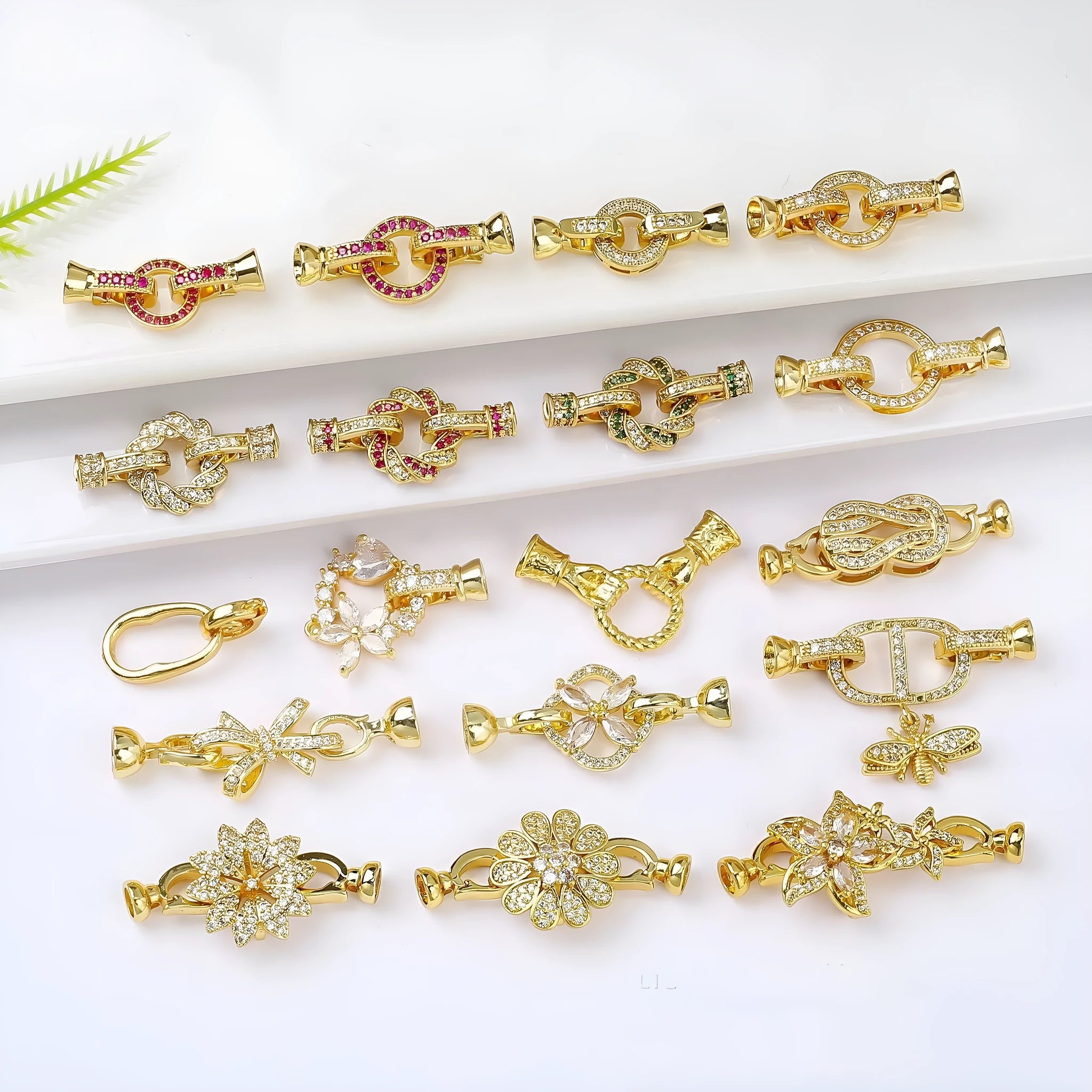 Small gold-coloured metal clasp buckle for DIY pearl necklace jewellery making