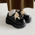 Black women's retro lace-up platform shoes with chunky 6-8cm sole and round toe