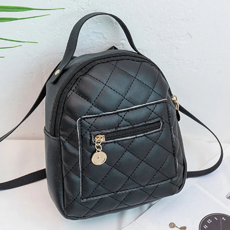 Hard shell square girls backpack with embroidery in black, pink, or white colours.