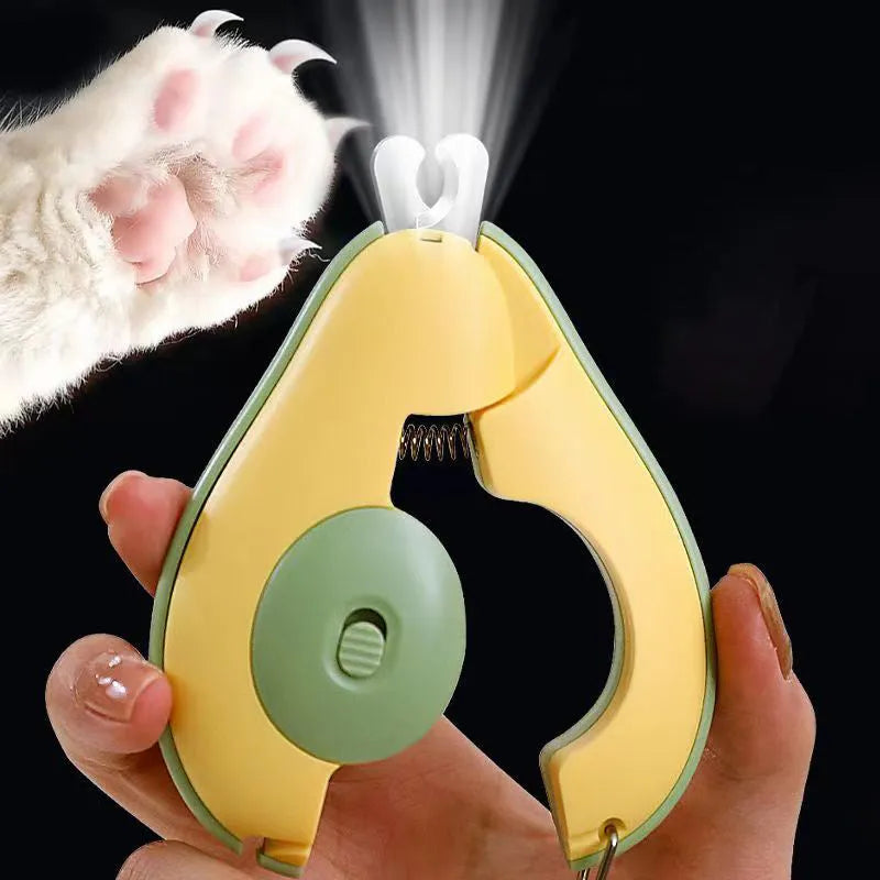 Green pet nail clipper with LED light on, showing scissor design and anti-slip handle for small dogs and cats.