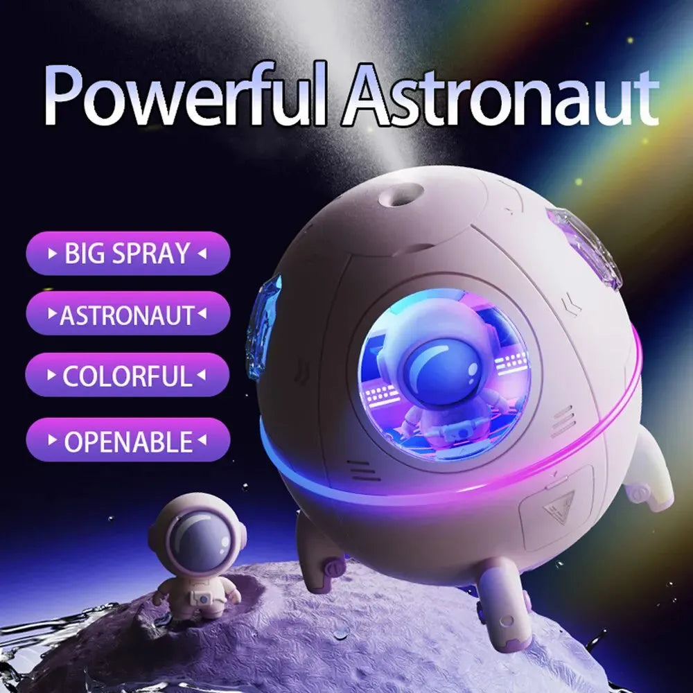 Light purple astronaut shaped USB humidifier with colourful LED light on a desk