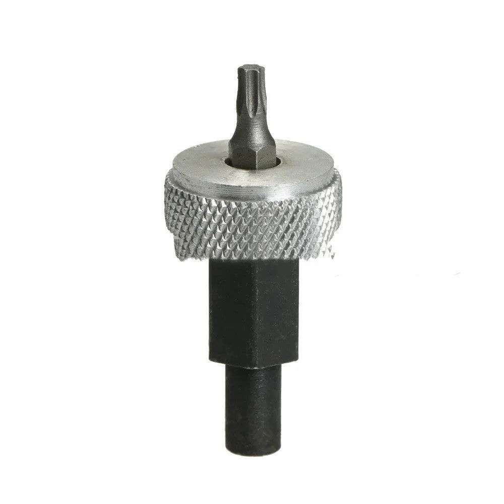 Close-up of an ignition module wrench tool with aluminium knurled knobs on a carbon steel handle.