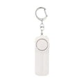 Compact pink personal safety alarm showing 130 dB siren specification and six-hour duration.
