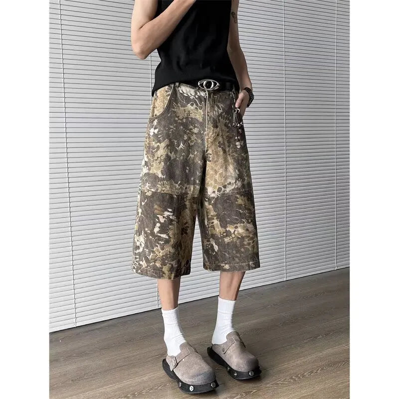 Yellow women's jeans with snake camouflage pattern and cropped length