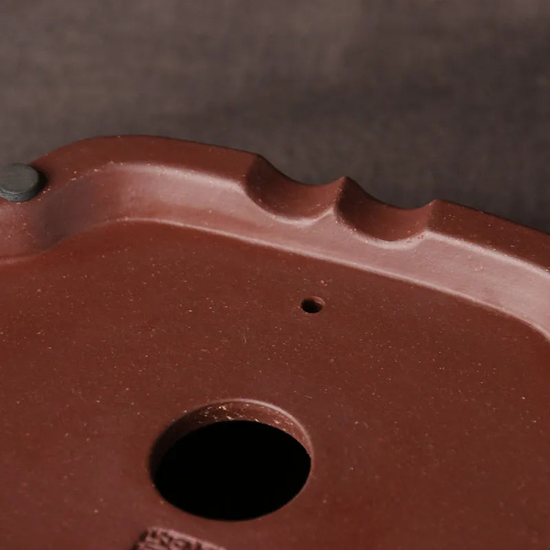 Handmade purple clay bonsai basin measuring 25x20x7 cm with classical Chinese design