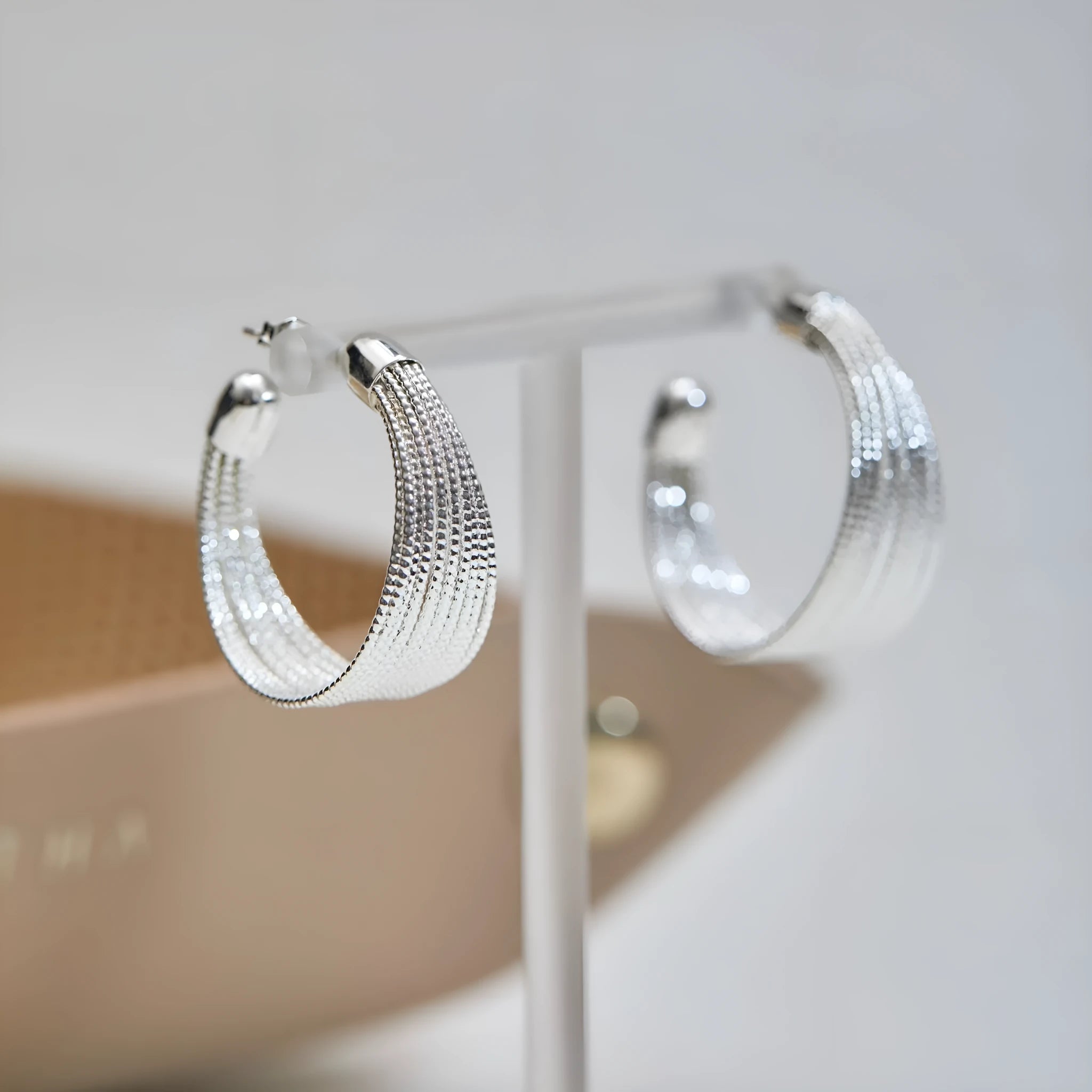 Geometric copper earrings with multi-layer bracelet design in gold and silver electroplated finishes