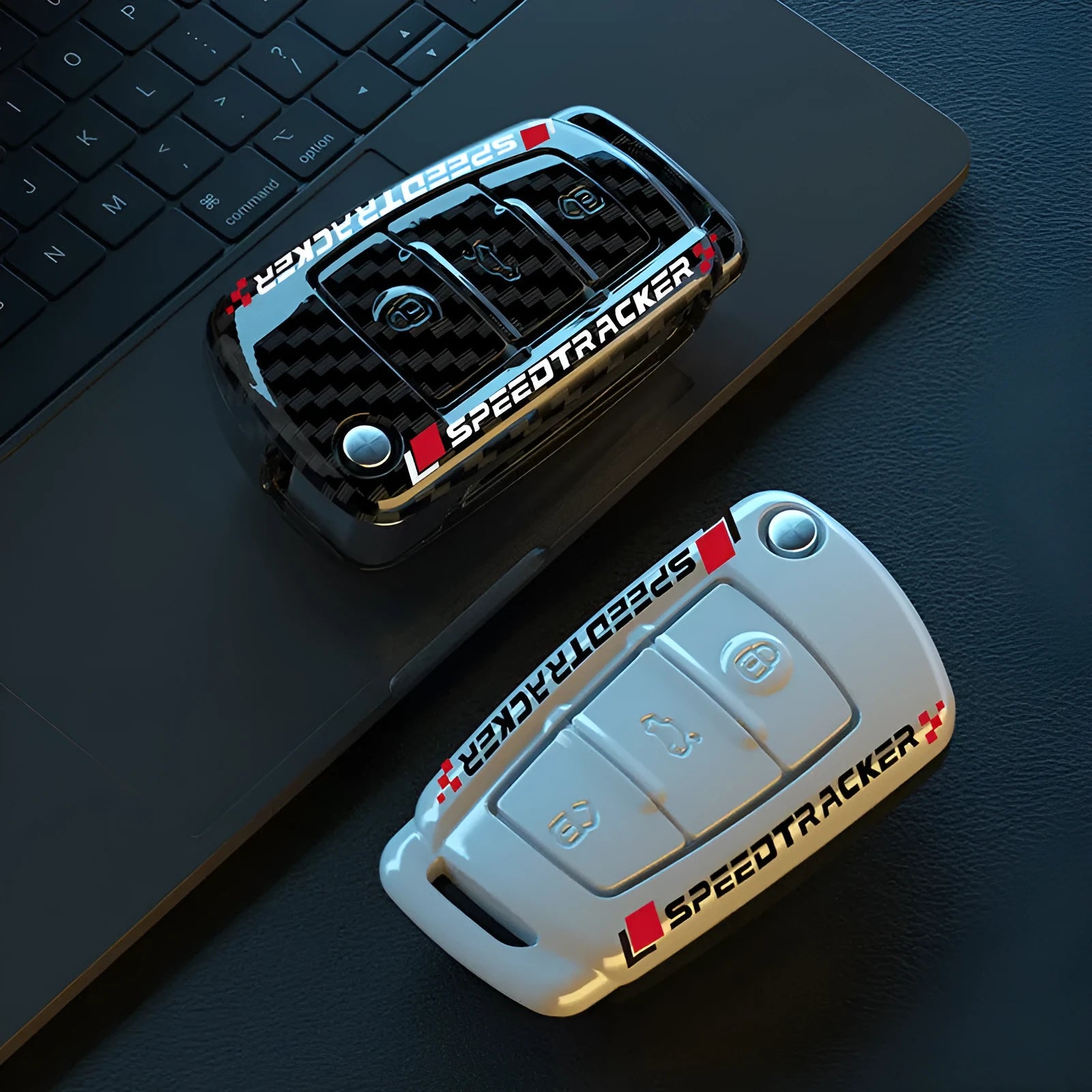 Carbon fibre style car key holder cover in white and carbon colour options with a small mirror.