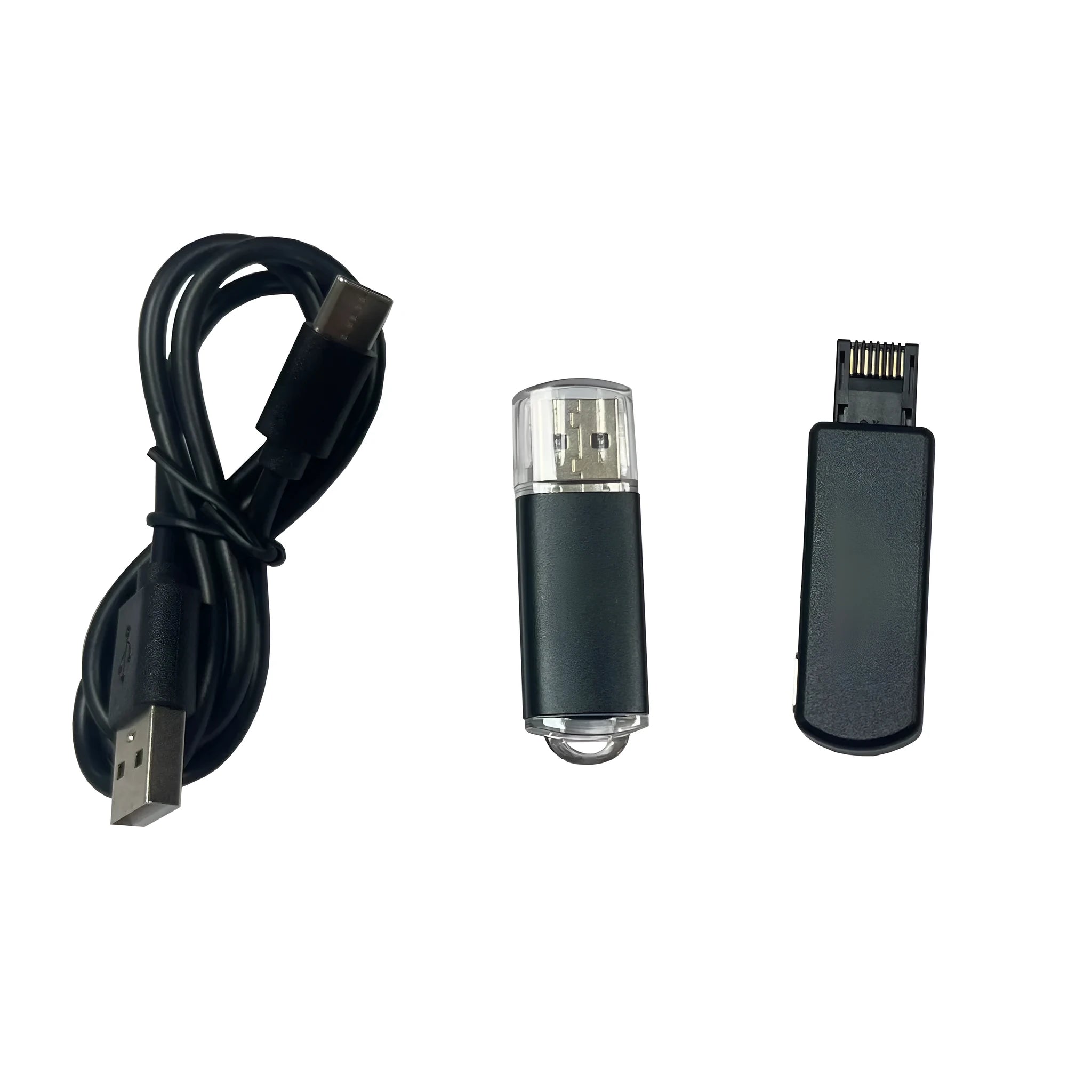 Black JB Tool USB gaming adapter with alloy construction next to its data cable and user manual.