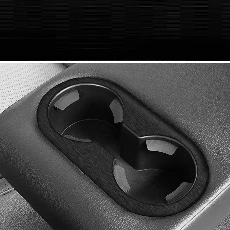 Unksera car interior decorative film sticker kit showing dashboard and centre console application with carbon fibre finish