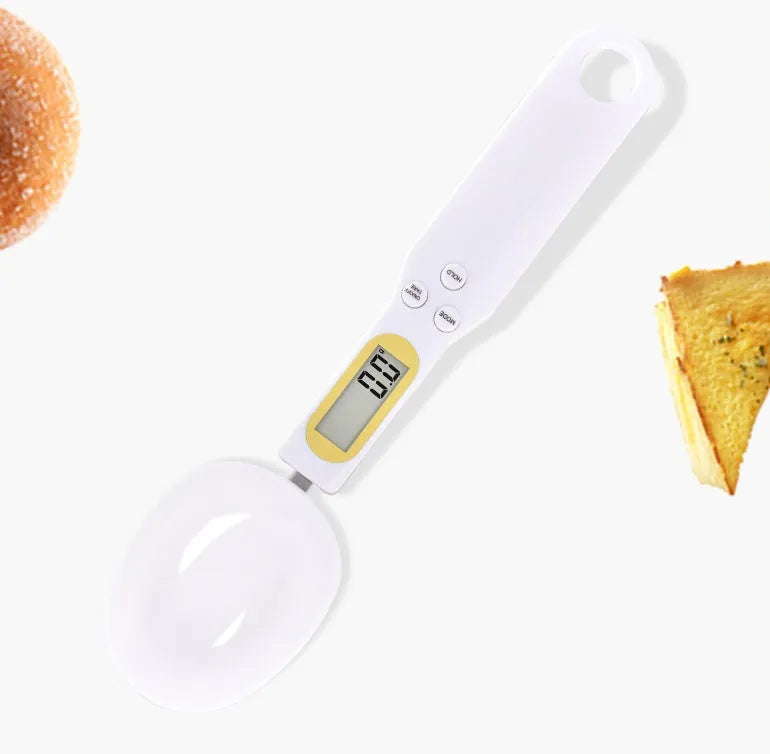 Black electronic measuring spoon scale showing digital display, 23.2cm long.