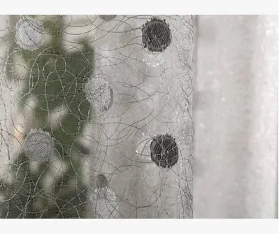 Single plain blackout curtain panel with hook tape heading, shown against a window.