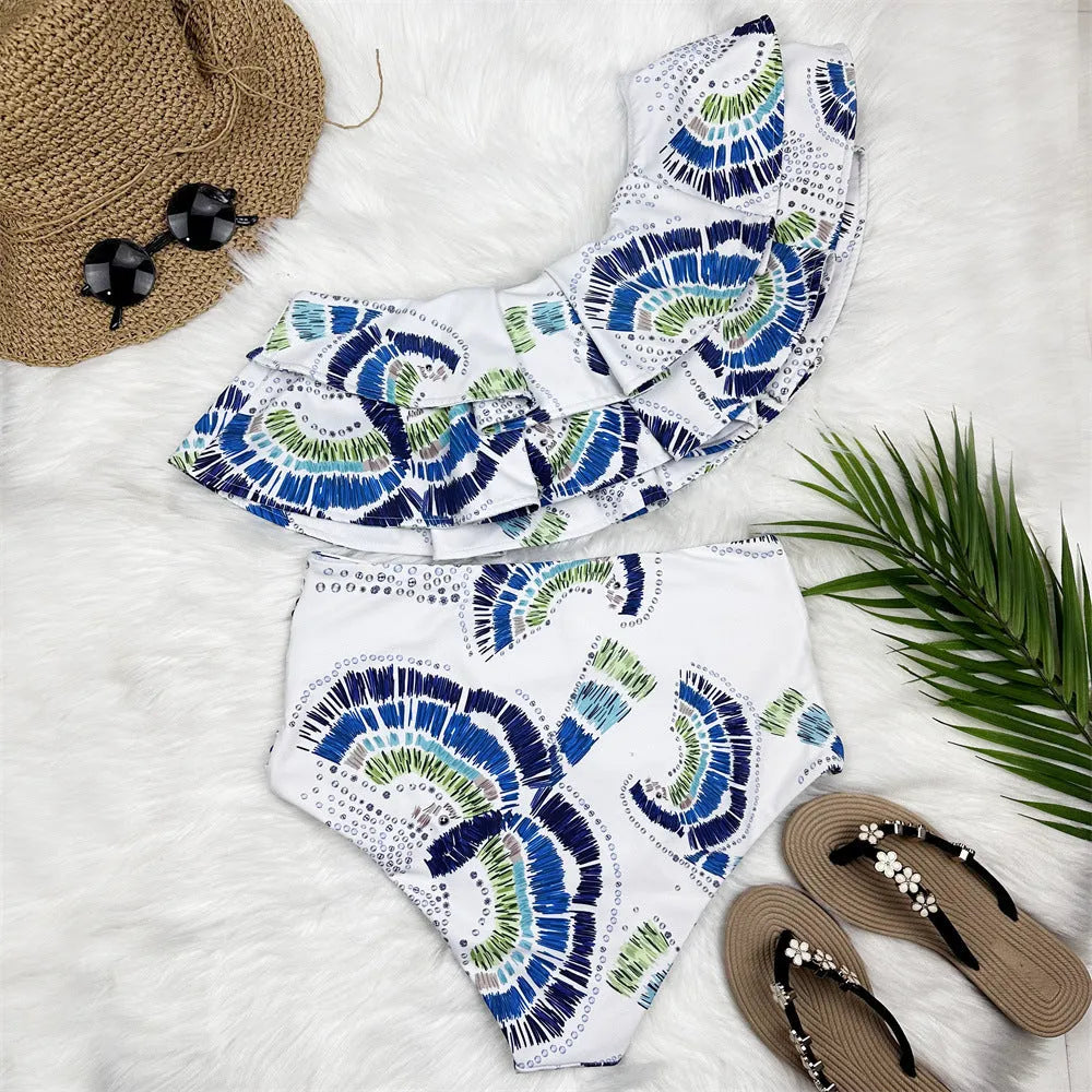White women's one-shoulder bikini with lotus leaf detail and double-layer construction.