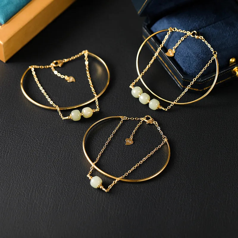 Women's Hetian jade bracelet with gold inlay detail, shown in single, double, and three bead versions.