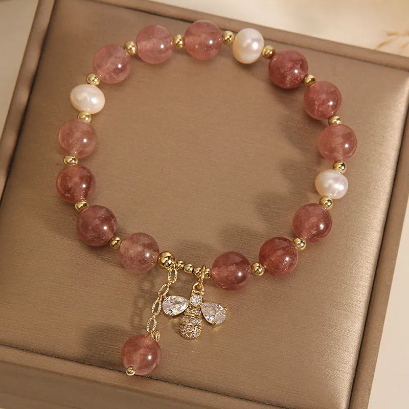 Women's pink strawberry quartz and white freshwater pearl bracelet with zircon accents on alloy chain